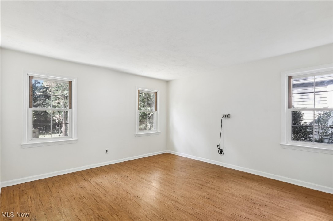 1042 Renfield Road Cleveland Heights, OH 44121 - Photo 18 of 49 Empty room with light hardwood / wood-style floors