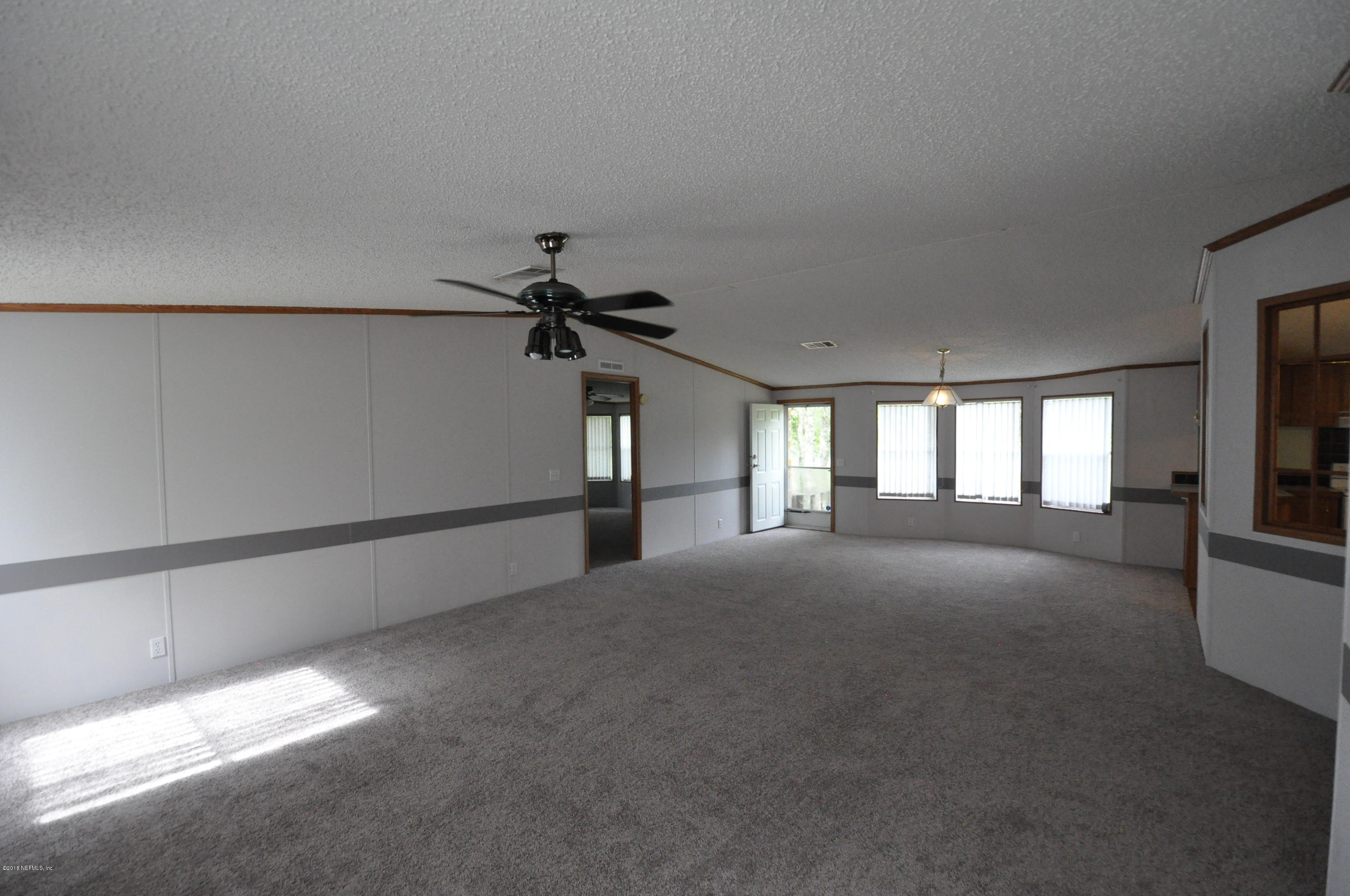 6216 Polka Road Jacksonville, FL 32234 - Photo 3 of 12 Family Room/Dining Room