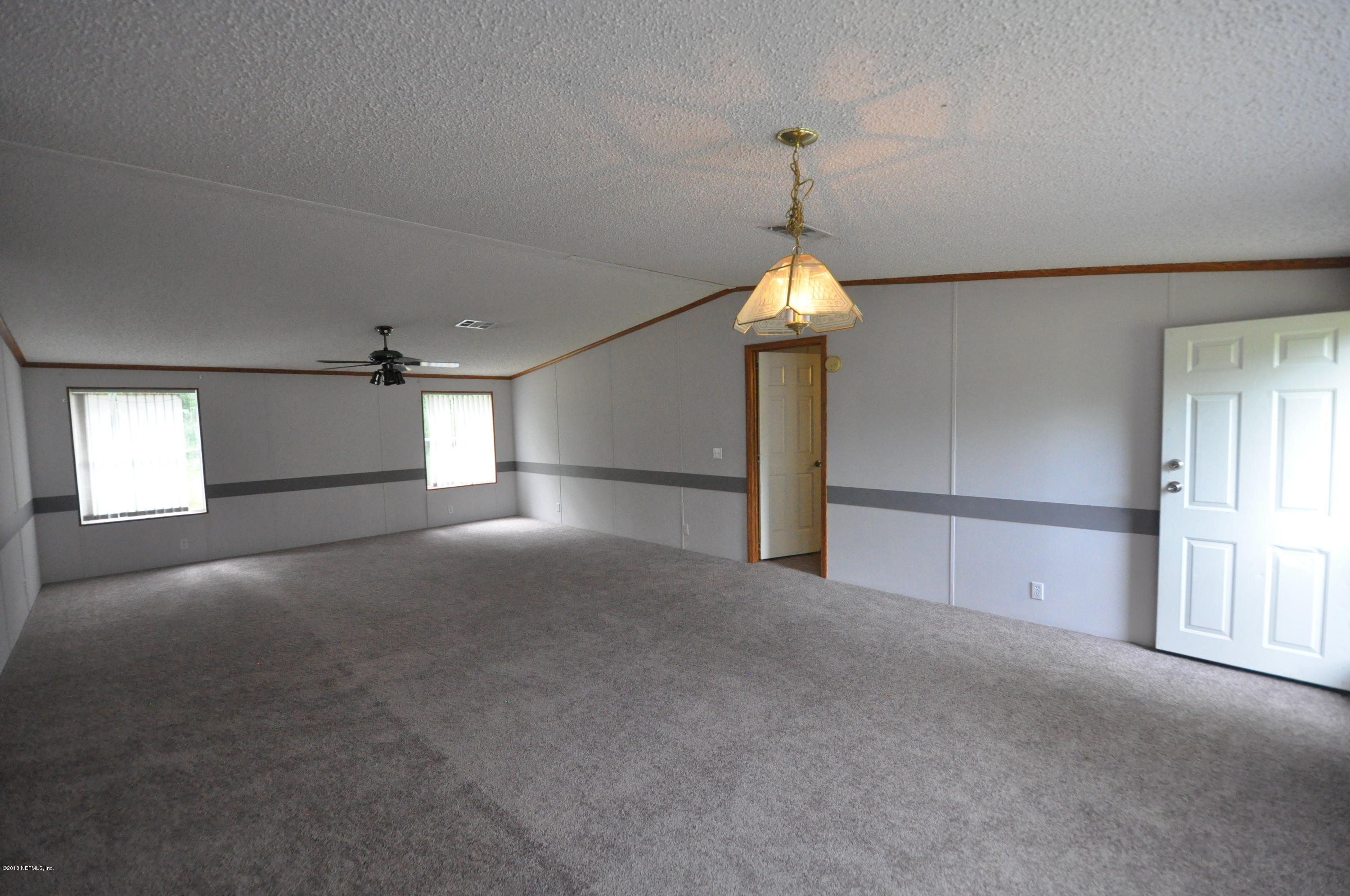 6216 Polka Road Jacksonville, FL 32234 - Photo 4 of 12 Family Room/Dining Room