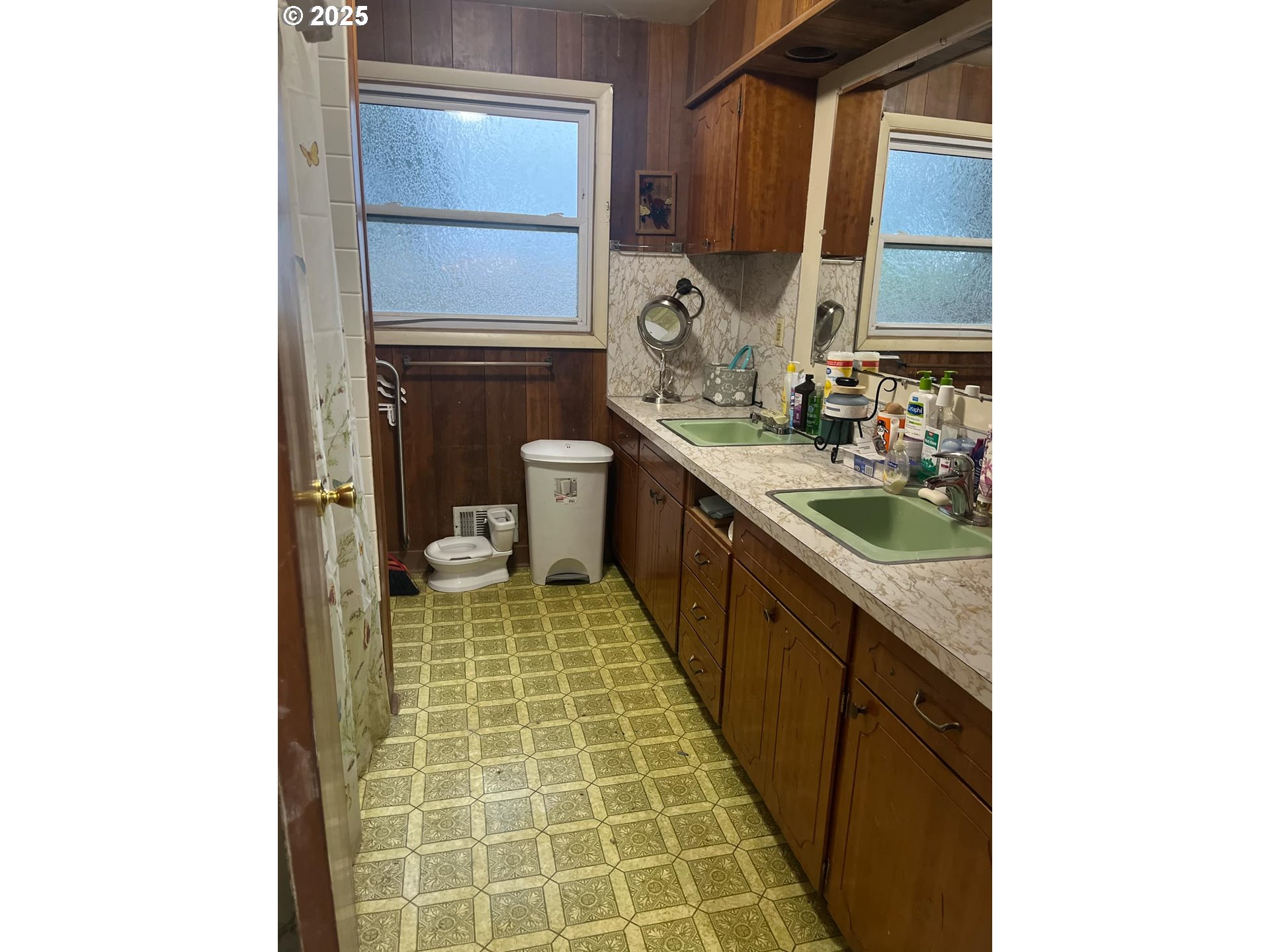 933 Southeast 174th Avenue Portland, OR 97233 - Photo 6 of 14 a bathroom with a sink and a mirror