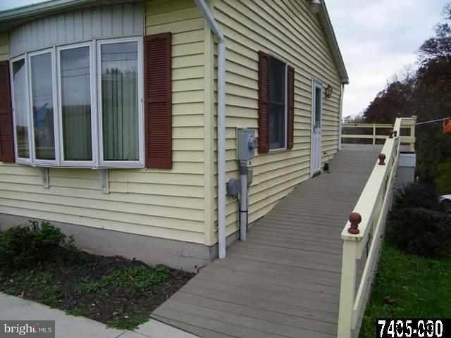 347 A Smoketown Road Hanover, PA 17331 - Photo 3 of 17 a view of a house with a small deck