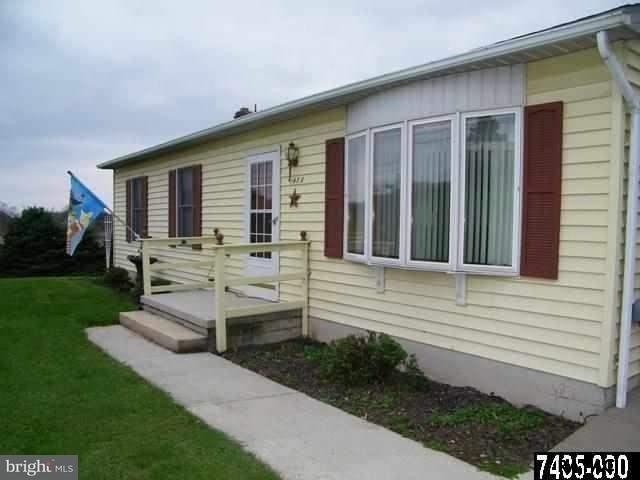 347 A Smoketown Road Hanover, PA 17331 - Photo 4 of 17 a view of house with backyard and outdoor seating