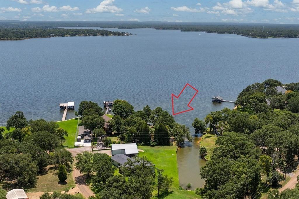 229 Esquire Estates Road Mabank, TX 75156 - Photo 3 of 19 an aerial view of a house with a garden and a yard