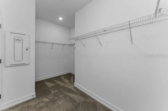 a view of a room with racks on the wall