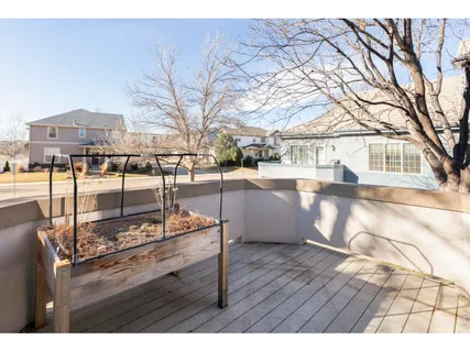 a view of a living room and kitchen