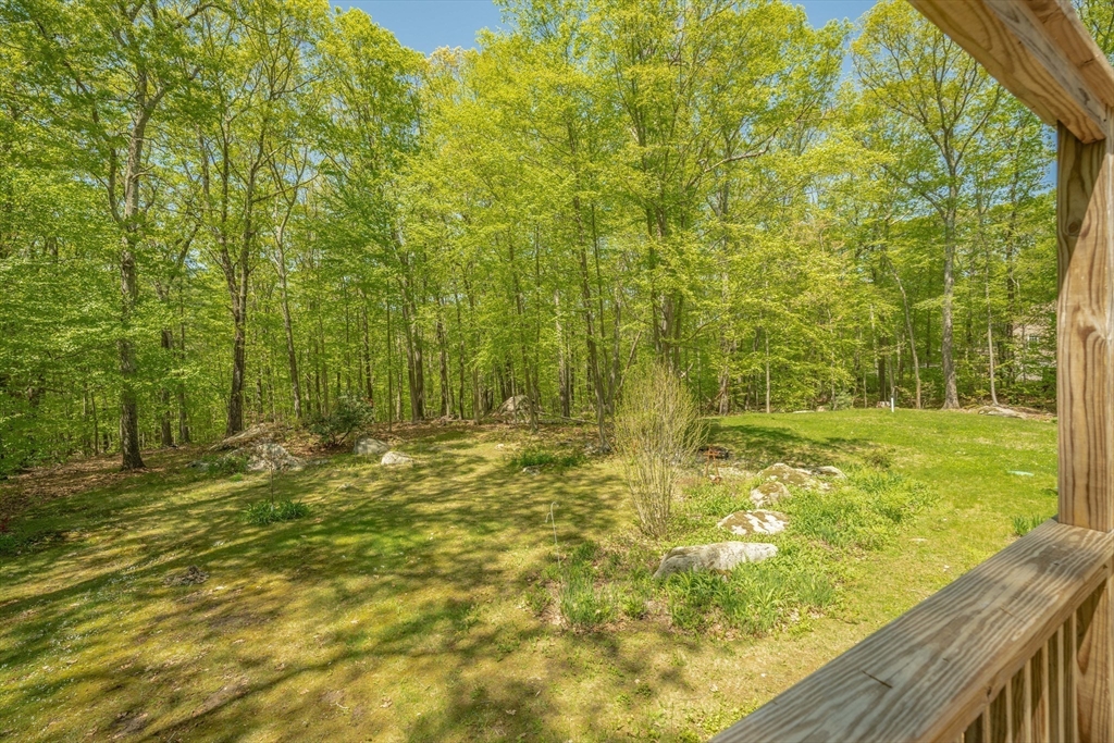 313 Bennett Road Hampden, MA 01036 - Photo 11 of 42 a view of a yard with an outdoor space