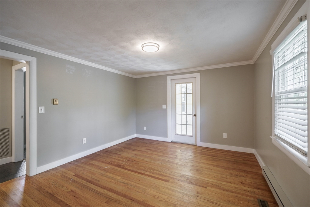 313 Bennett Road Hampden, MA 01036 - Photo 22 of 42 wooden floor in an empty room with a window