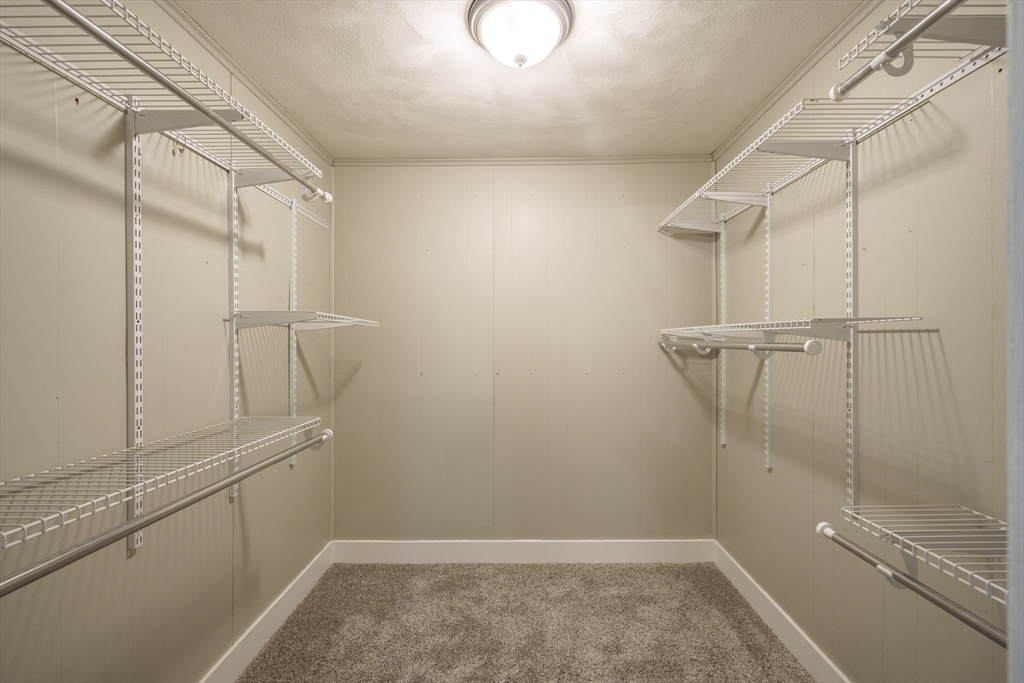 313 Bennett Road Hampden, MA 01036 - Photo 28 of 42 a view of a room with racks on the wall