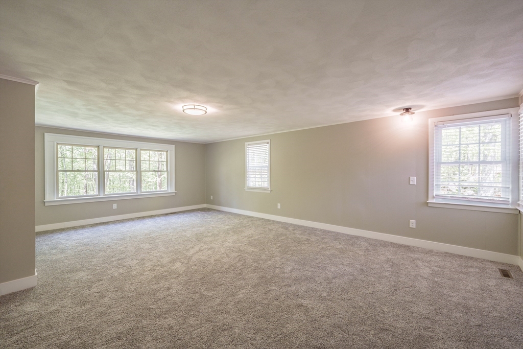 313 Bennett Road Hampden, MA 01036 - Photo 29 of 42 an empty room with windows