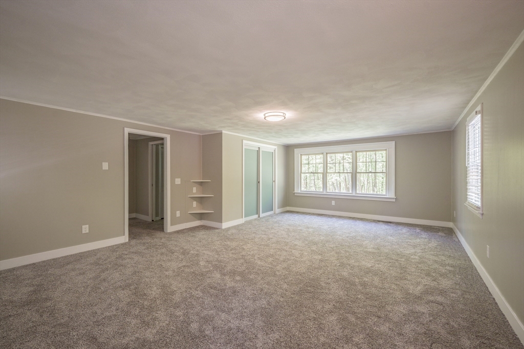 313 Bennett Road Hampden, MA 01036 - Photo 30 of 42 a view of an empty room with a window