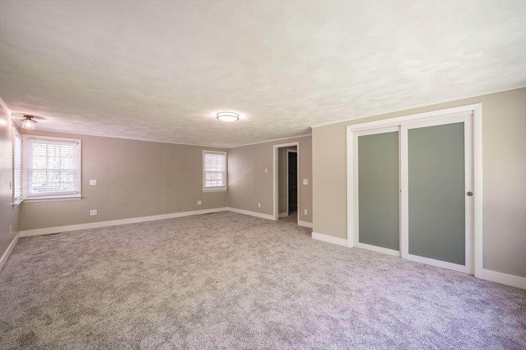 313 Bennett Road Hampden, MA 01036 - Photo 31 of 42 a view of an empty room with a window