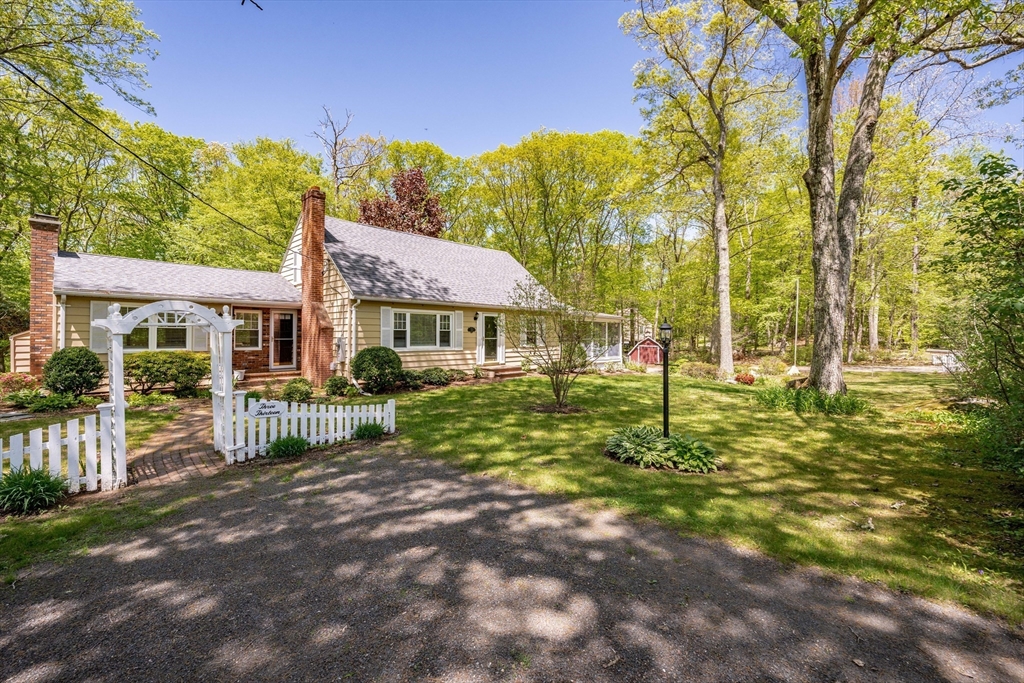 313 Bennett Road Hampden, MA 01036 - Photo 42 of 42 a front view of a house with garden