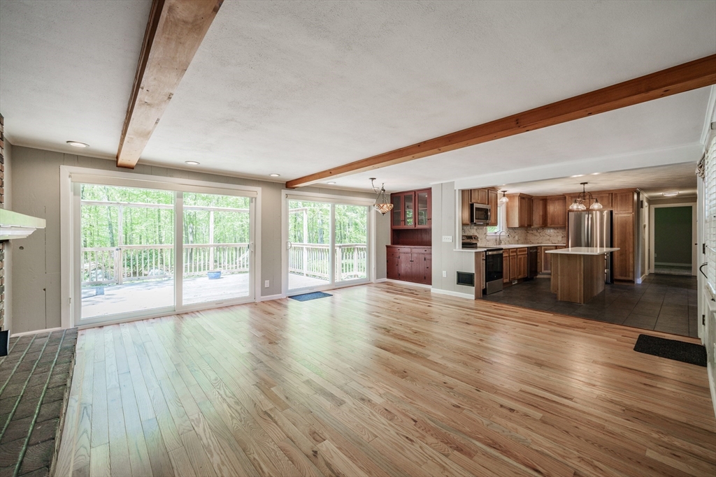 313 Bennett Road Hampden, MA 01036 - Photo 6 of 42 a view of a livingroom with wooden floor