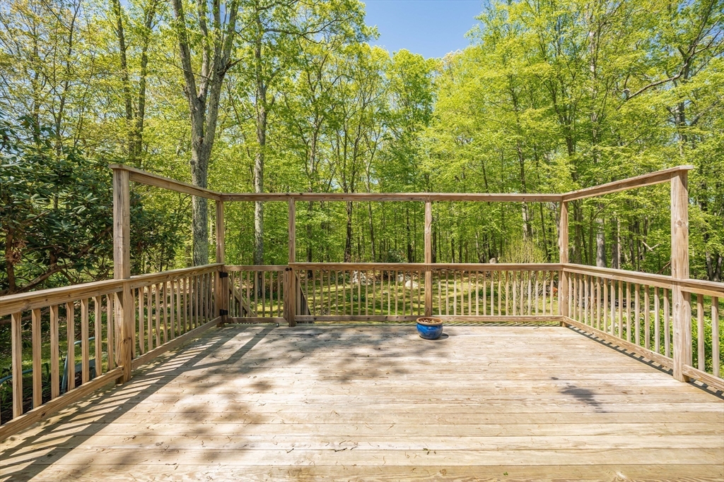 313 Bennett Road Hampden, MA 01036 - Photo 9 of 42 a view of a wooden deck