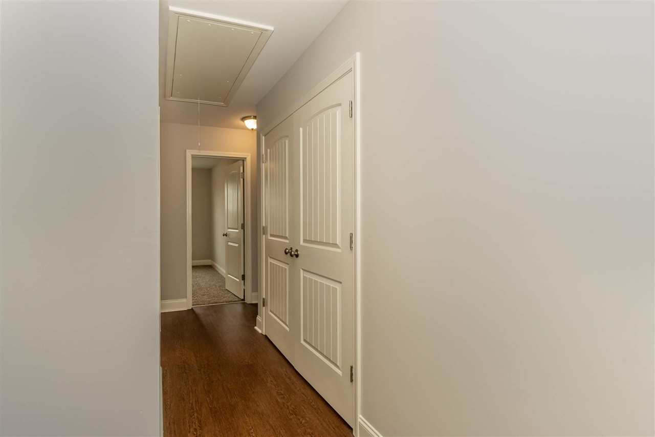 3934 Volkswalk Place Raleigh, NC 27610 - Photo 3 of 16 a view of a hallway