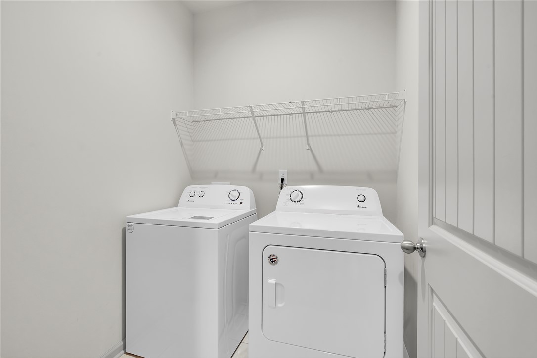 302 Phillips Drive Pendleton, SC 29670 - Photo 15 of 27 This dedicated space includes a washer and dryer for effortless laundry days.