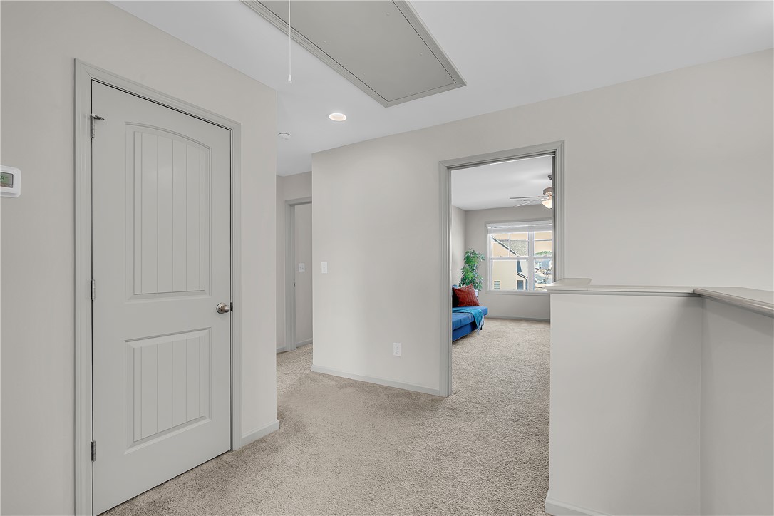 302 Phillips Drive Pendleton, SC 29670 - Photo 17 of 27 This interior hallway features carpet flooring, recessed lighting, and access to other living spaces.