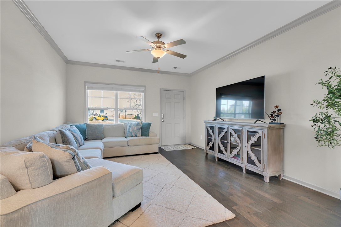 302 Phillips Drive Pendleton, SC 29670 - Photo 2 of 27 This airy living space features abundant natural light, creating an inviting atmosphere for everyday living.