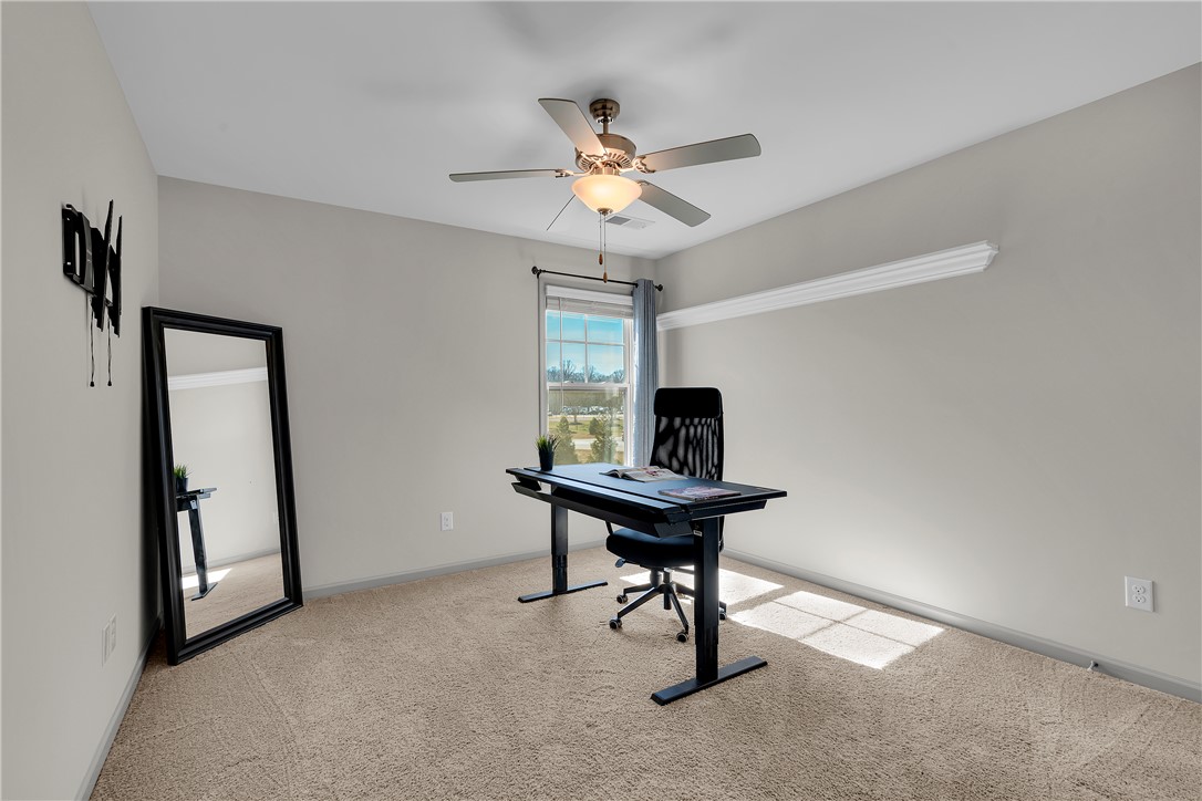 302 Phillips Drive Pendleton, SC 29670 - Photo 21 of 27 This versatile room offers an ideal setting for productivity and relaxation.