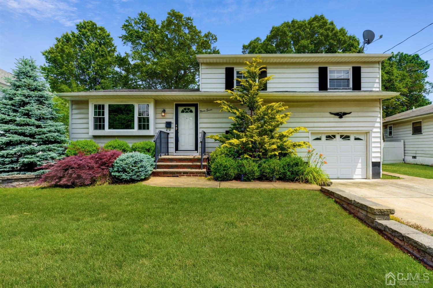 37 Finley Road Edison, NJ 08817 - Photo 1 of 29 front view of a house with a yard