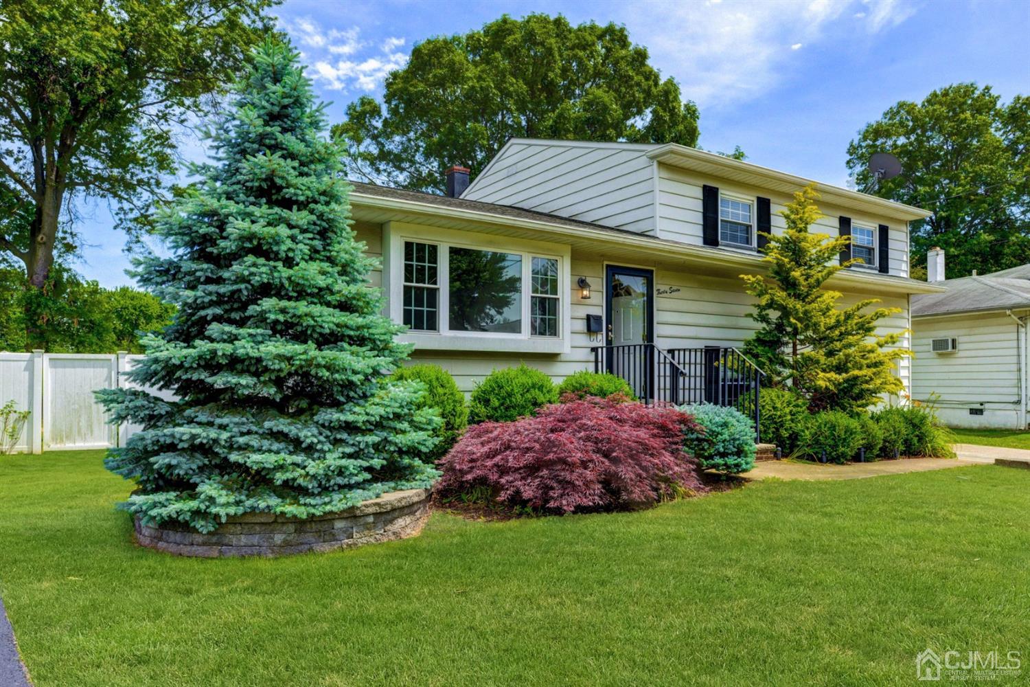 37 Finley Road Edison, NJ 08817 - Photo 2 of 29 a view of a house with a garden