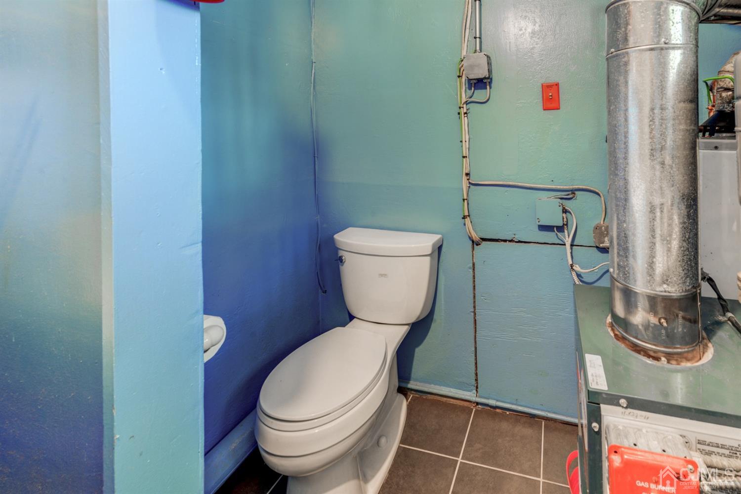 37 Finley Road Edison, NJ 08817 - Photo 13 of 29 a bathroom with a toilet and a shower