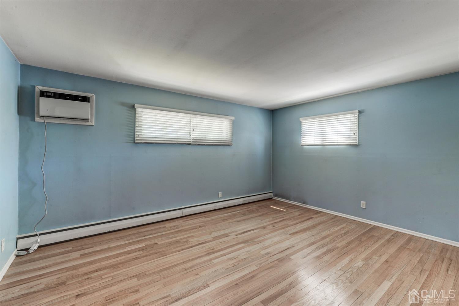 37 Finley Road Edison, NJ 08817 - Photo 19 of 29 a view of empty room with wooden floor