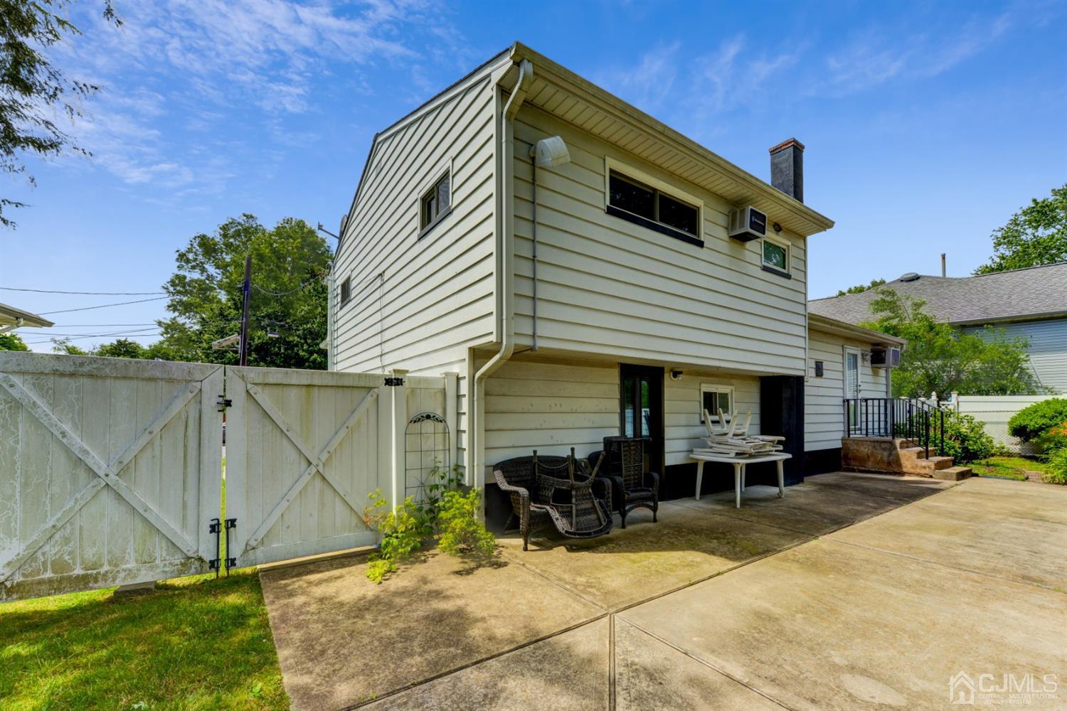 37 Finley Road Edison, NJ 08817 - Photo 25 of 29 a view of house with patio outdoor seating and entertaining space