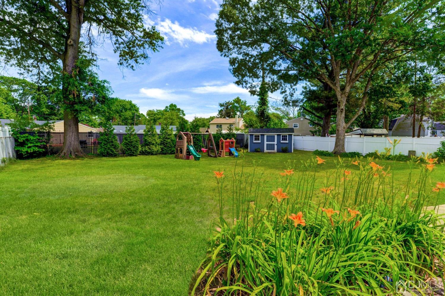 37 Finley Road Edison, NJ 08817 - Photo 26 of 29 a view of a house with a big yard