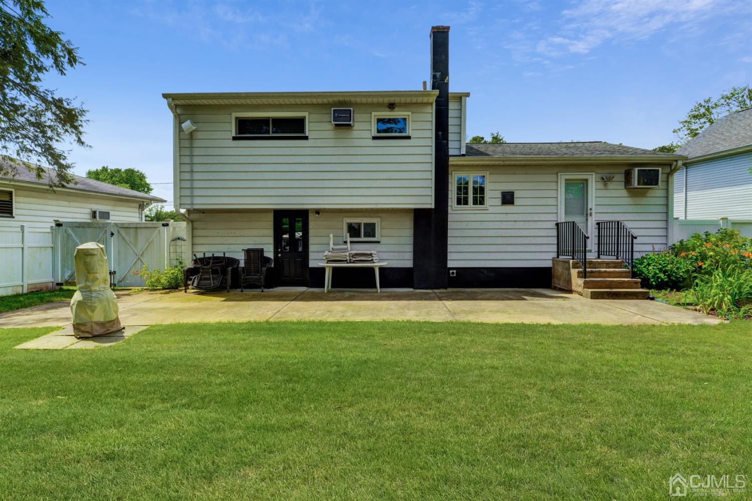 37 Finley Road Edison, NJ 08817 - Photo 28 of 29 a front view of a house with garden