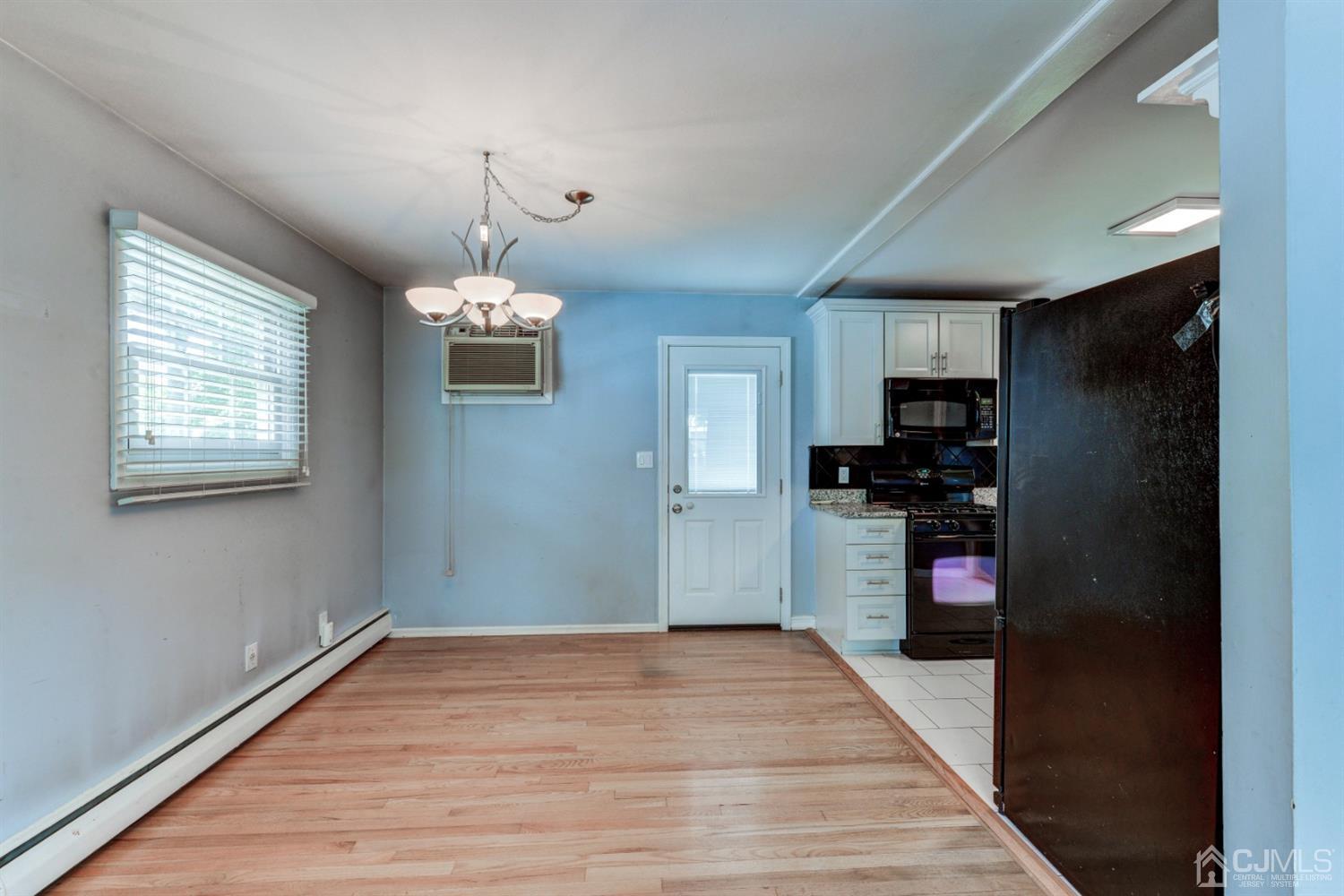 37 Finley Road Edison, NJ 08817 - Photo 8 of 29 a kitchen view with stainless steel appliances a refrigerator and a stove top oven