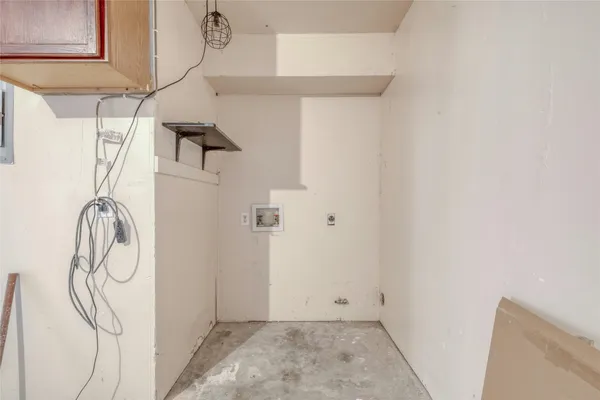 a view of small space with white walls