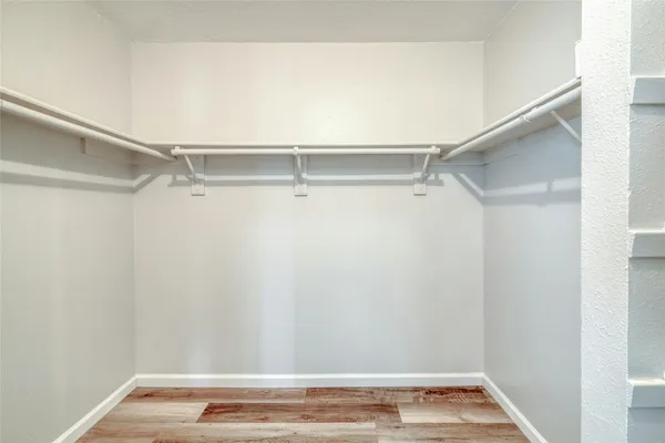 a view of a room with racks on the wall