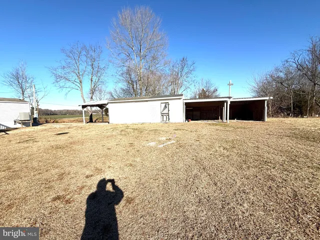 a view of swimming pool with a yard