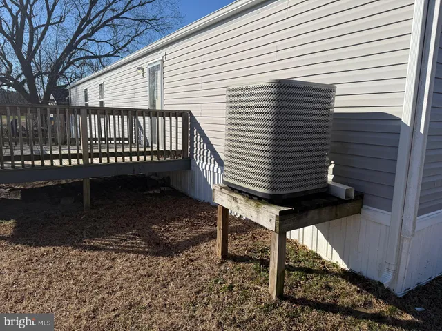 a view of a chairs setting on the roof deck