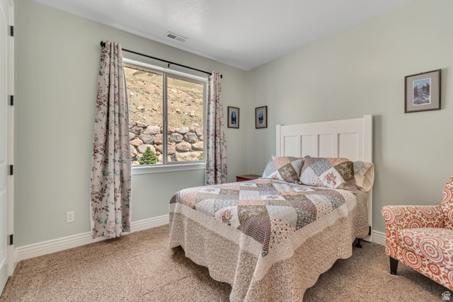 2543 East 700 South Springville, UT 84663 - Photo 40 of 73 Carpeted bedroom featuring baseboards