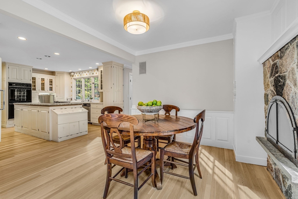 1437-3 Monument Street Concord, MA 01742 - Photo 11 of 41 a view of a dining room with furniture and a kitchen
