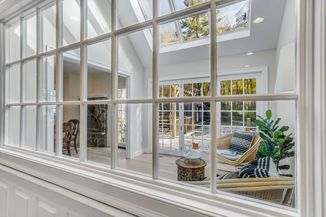 a view of a living room and window