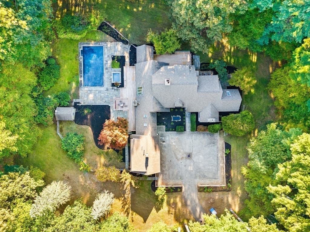 1437-3 Monument Street Concord, MA 01742 - Photo 2 of 41 an aerial view of a house with patio