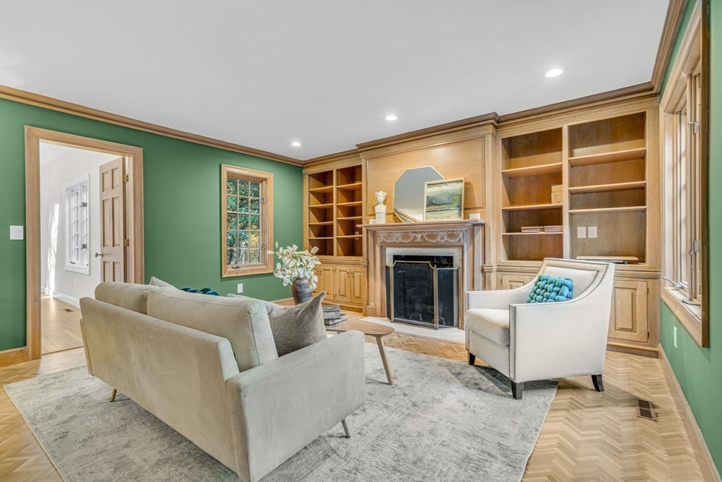 1437-3 Monument Street Concord, MA 01742 - Photo 21 of 41 a living room with furniture and a fireplace