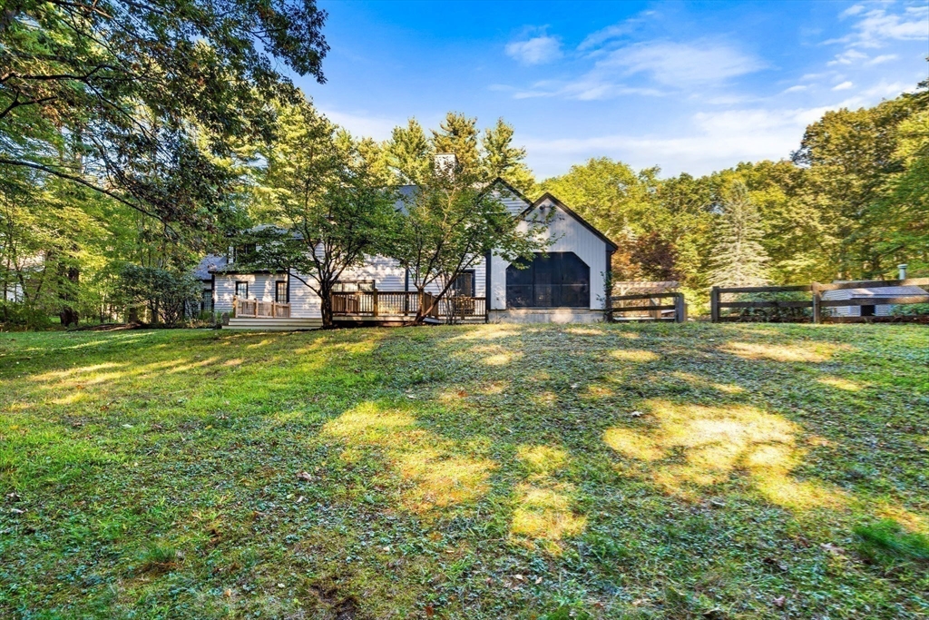 1437-3 Monument Street Concord, MA 01742 - Photo 31 of 41 a view of a house with a big yard