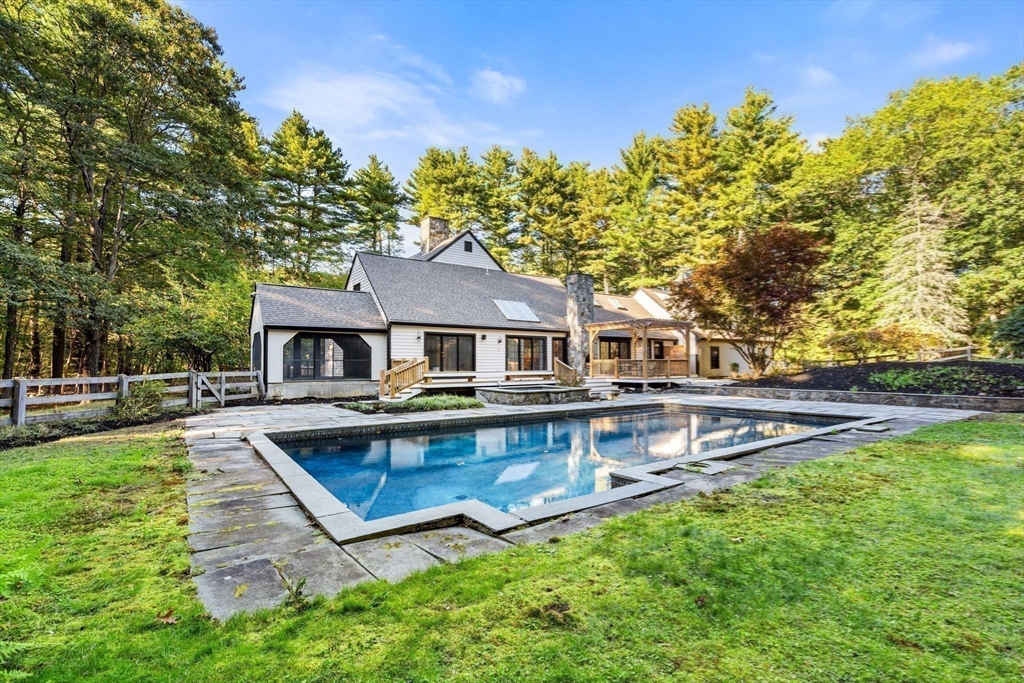 1437-3 Monument Street Concord, MA 01742 - Photo 37 of 41 a aerial view of a house with swimming pool and sitting area