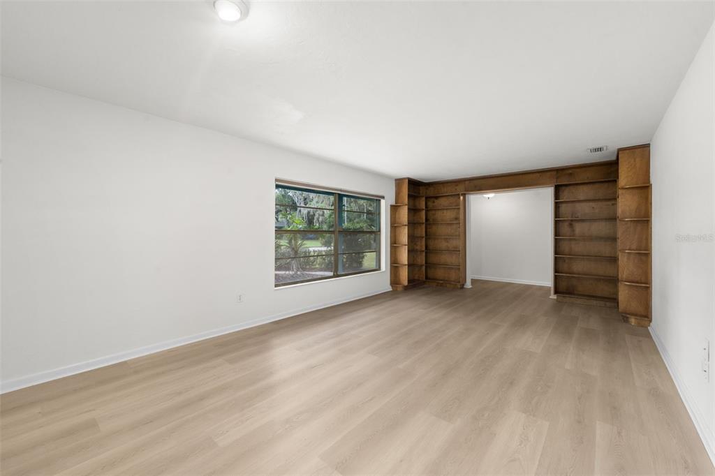 4825 Southwest 19th Street Gainesville, FL 32608 - Photo 5 of 40 an empty room with windows