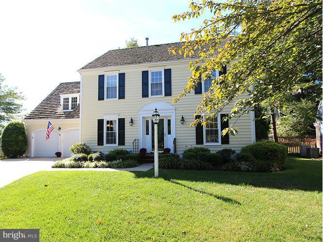 8 Midsummer Court Gaithersburg, MD 20878 - Photo 1 of 30 a front view of a house with garden