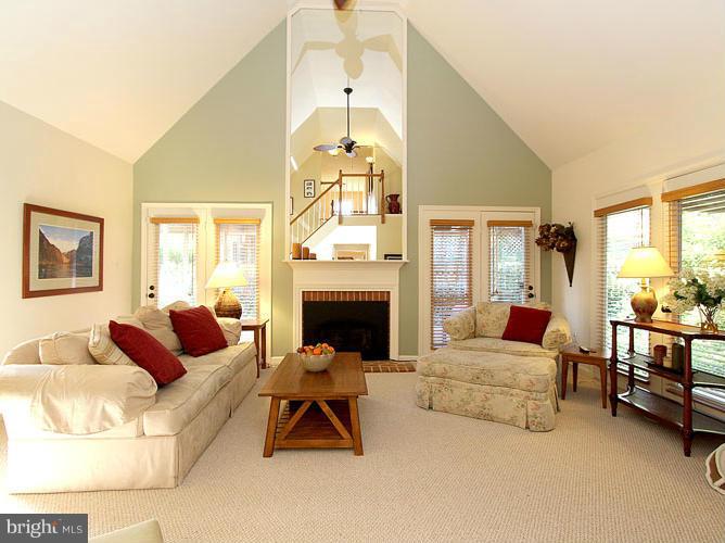 8 Midsummer Court Gaithersburg, MD 20878 - Photo 12 of 30 a living room with furniture and a fireplace