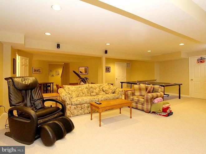 8 Midsummer Court Gaithersburg, MD 20878 - Photo 25 of 30 a living room with couches and kitchen view