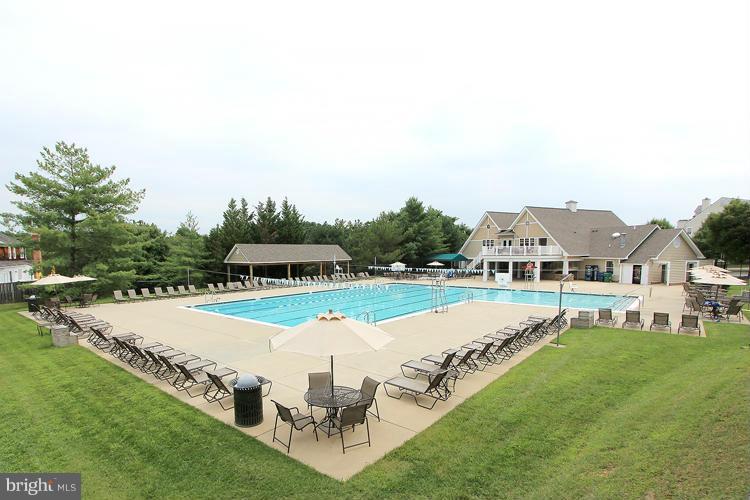 8 Midsummer Court Gaithersburg, MD 20878 - Photo 29 of 30 a view of a house with swimming pool and yard