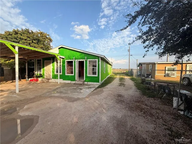 a view of a house with a patio