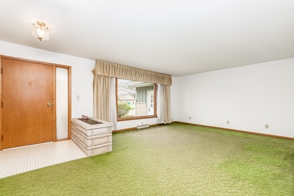 2603 Caton Farm Road Joliet, IL 60435 - Photo 4 of 22 a view of an empty room with glass door