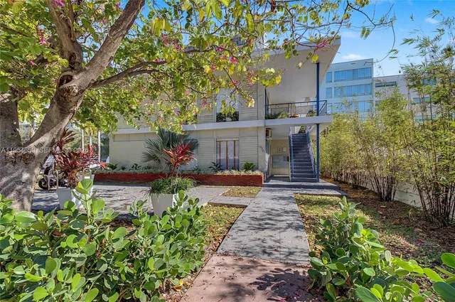 a view of hallway with stairs